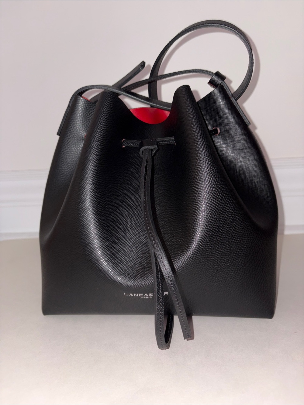 Lancaster Paris Black and Red Interior Bucket Bag
